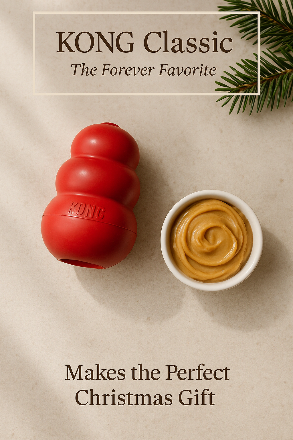 kong-classic-christmas-flatlay Christmas-themed flatlay of a red KONG Classic dog toy with peanut butter on a neutral background and subtle holiday greenery.